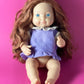 Lifelike Baby Doll with Blue Eyes and Brown Hair – Perfect Gift for Kids!